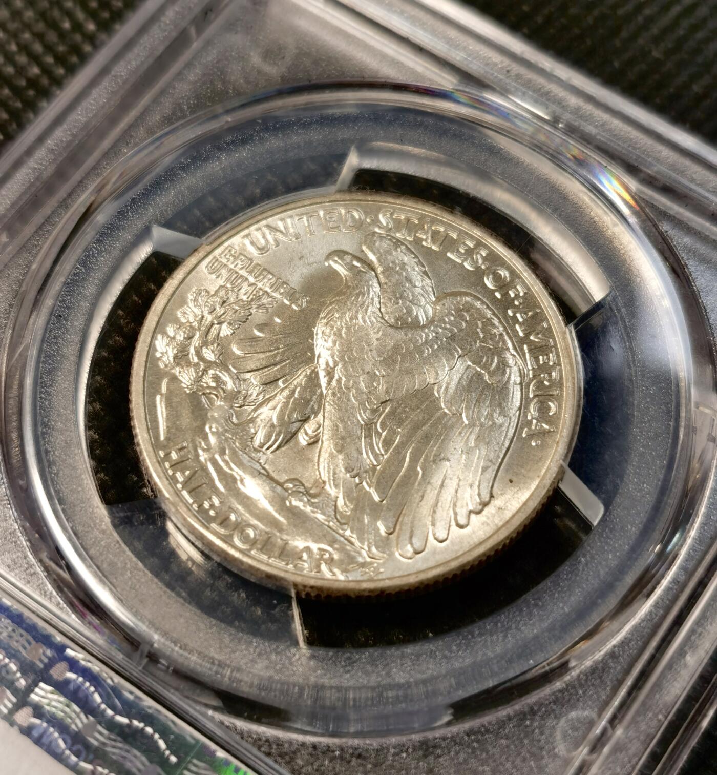  甄臻铺-世界币章拍卖（第26期），送拍享返佣金等优惠多多 PCGS-MS65 美国1941年行走女神50美分，少见高分，流水转光