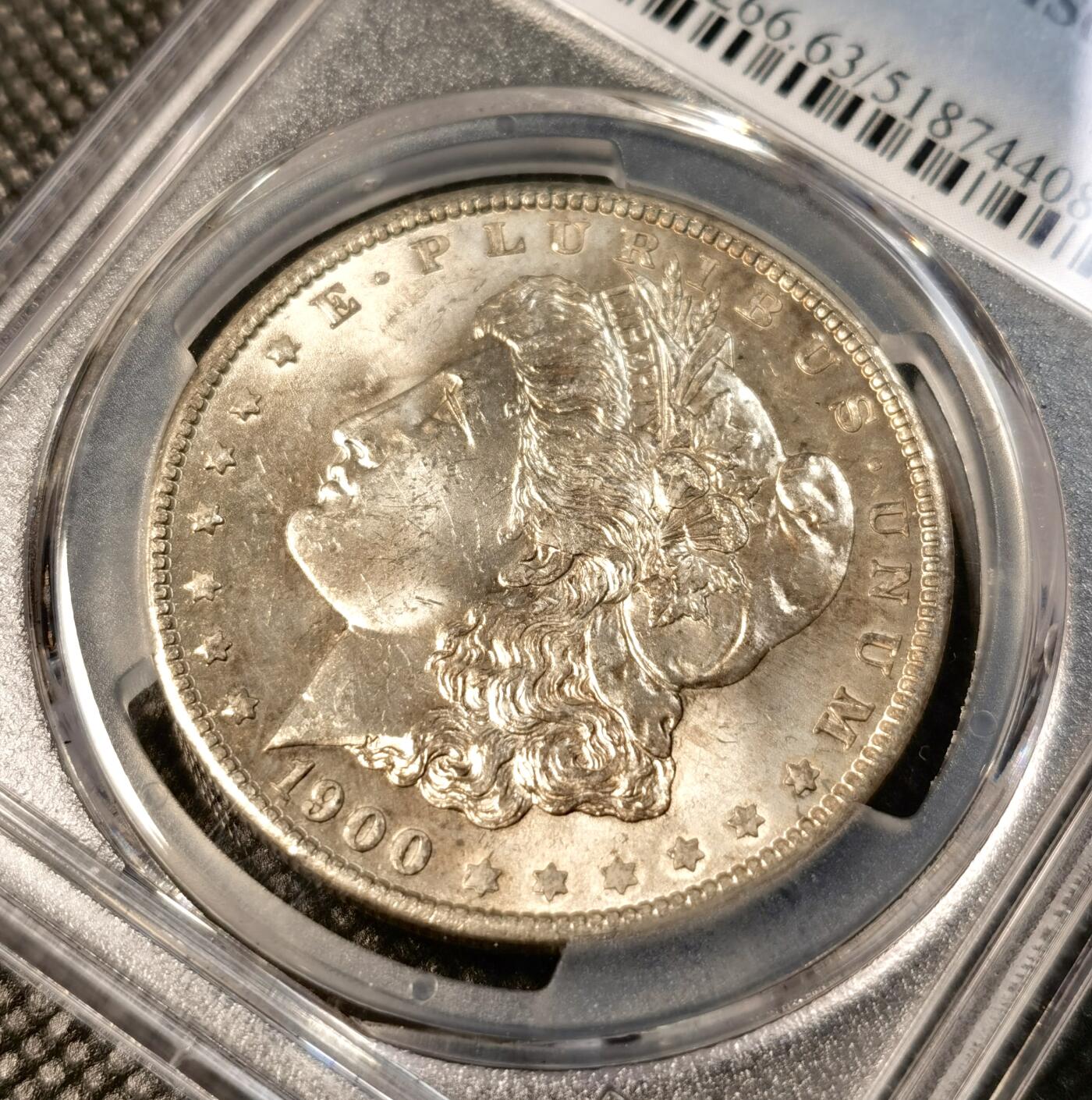  甄臻铺-世界币章拍卖（第26期），送拍享返佣金等优惠多多 PCGS-MS63 1900年O版摩根，金彩包浆，不多见的年份