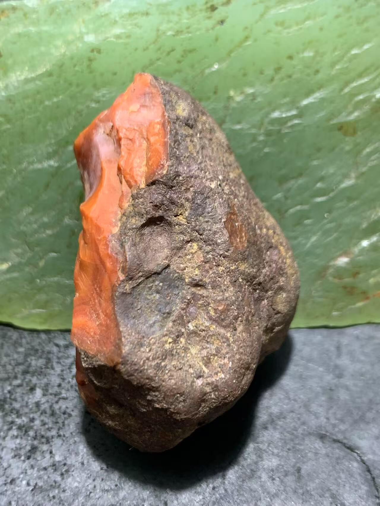 精美铁皮冰飘柿子红开窗料南红玛瑙原石一颗