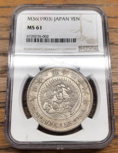 凡希社世界钱币微拍月度大拍（2025/07） - 明治三十六年龙壹元NGC-MS61，淡彩粉光品。