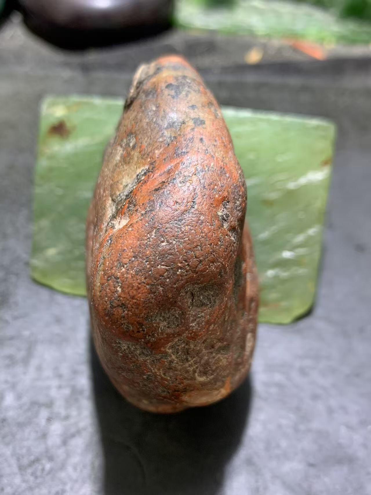 精美冰飘红皮开窗料柿子红冻料南红玛瑙原石一颗，