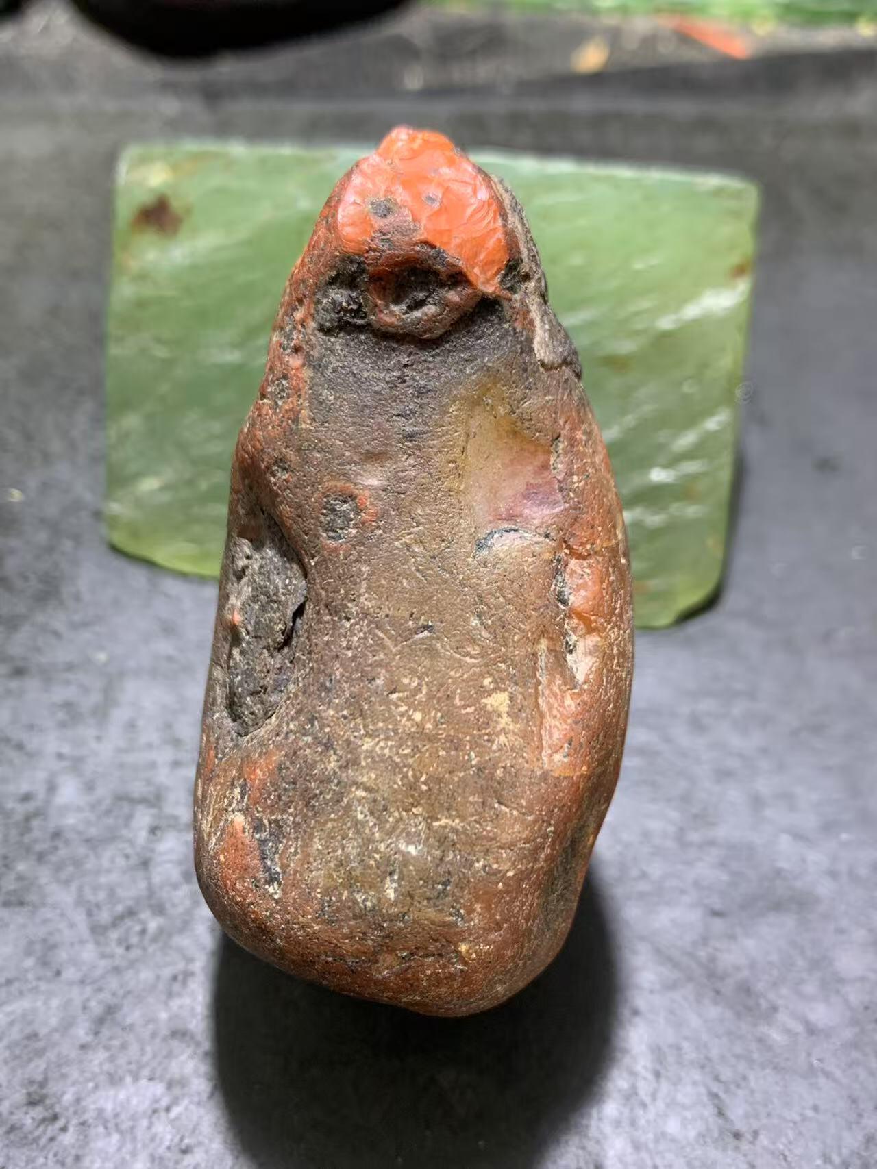 精美冰飘红皮开窗料柿子红冻料南红玛瑙原石一颗，