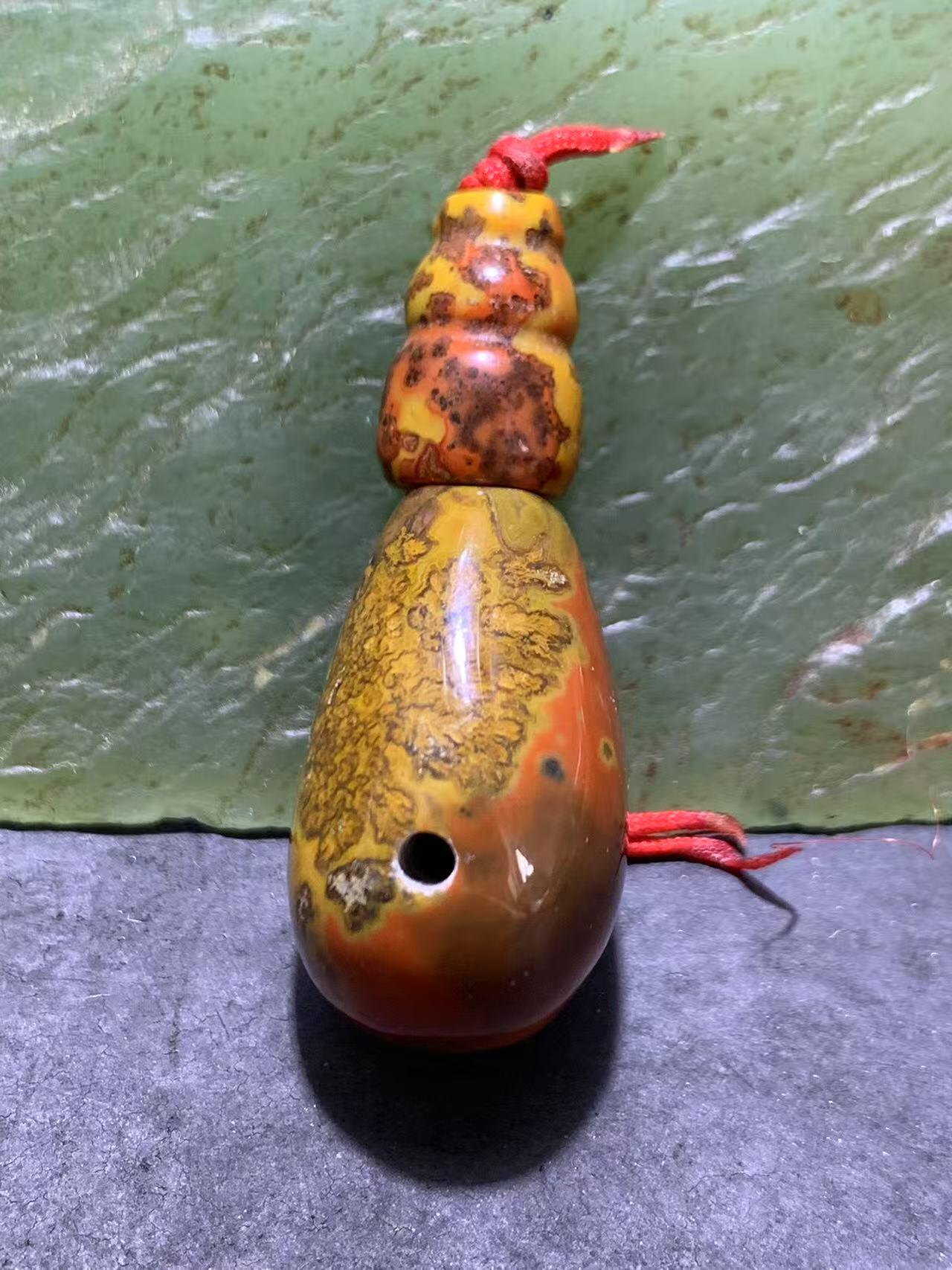 精美草花纹战国红玛瑙佛头三通一套