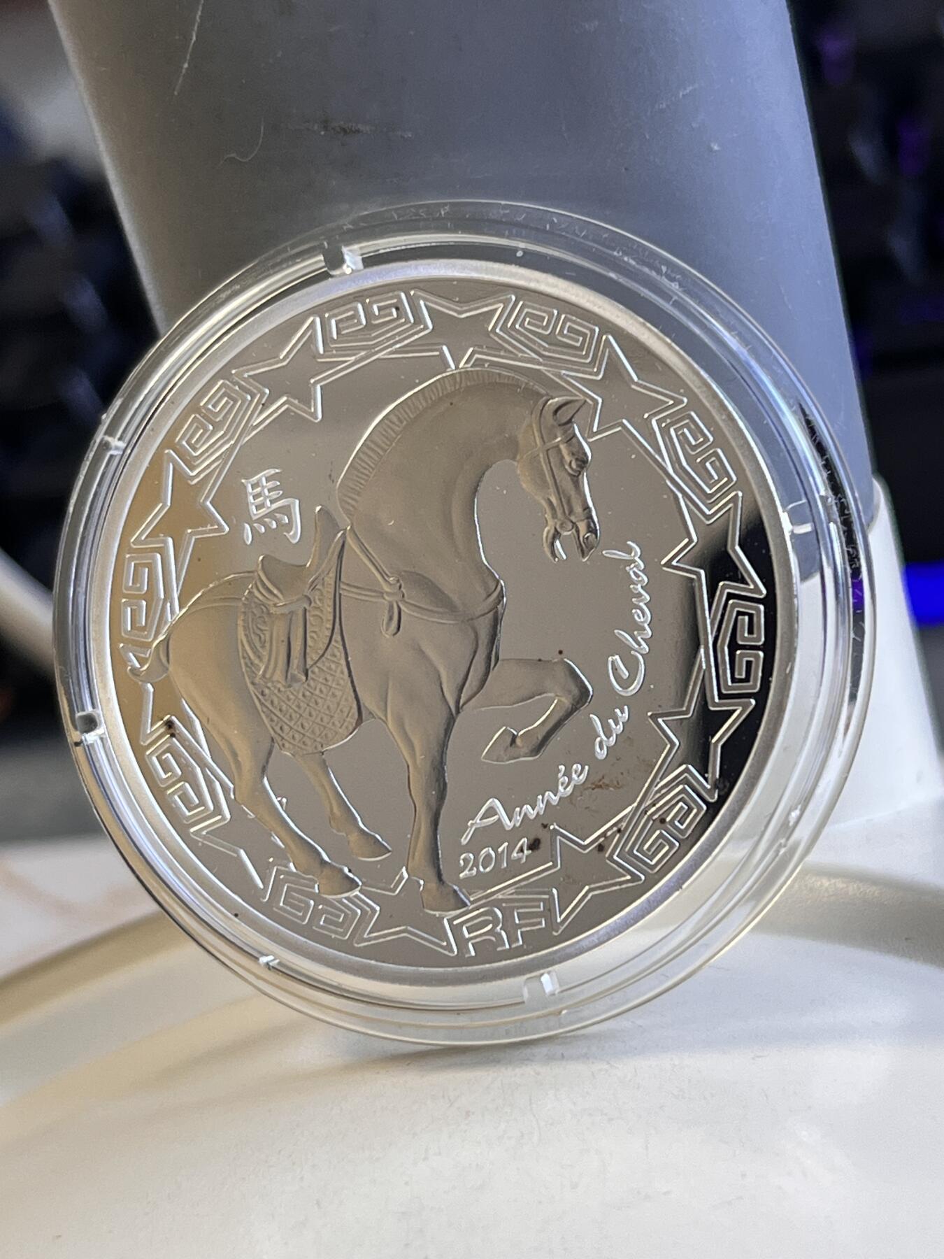 第168期拍卖【长期征集拍品】 法国2014年中国生肖系列9马年精制10欧纪念银币，900银，22.2克，发行10000枚，有氧化黑点