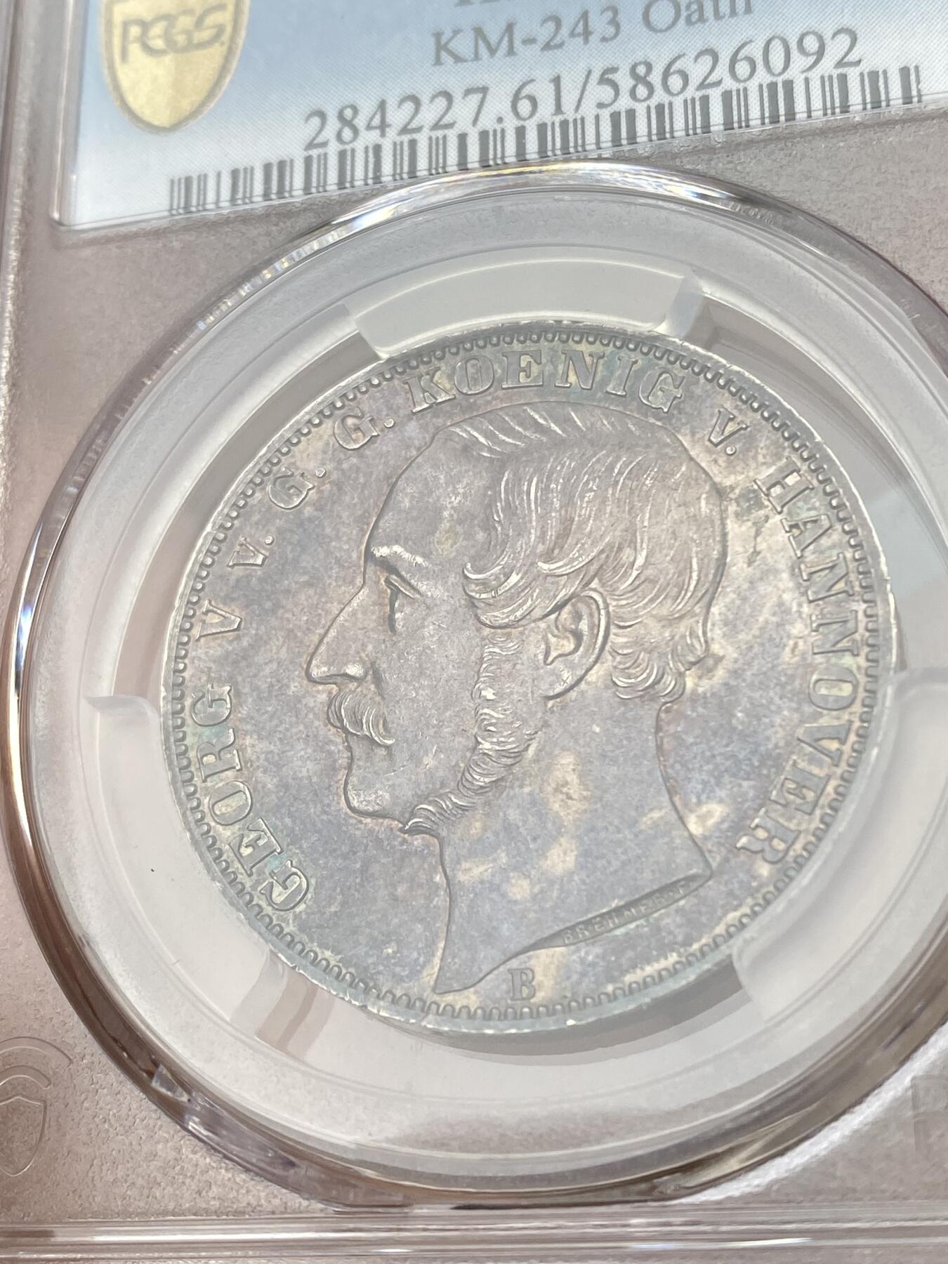 万国钱币拍卖第050期（万国五十期纪念大拍） PCGS MS61 1865年德国汉诺威弗里斯兰橡树箴言泰勒 仅发行2000枚的联合泰勒大名誉品 高点状态异常出彩 深度欧陆红酒色包浆