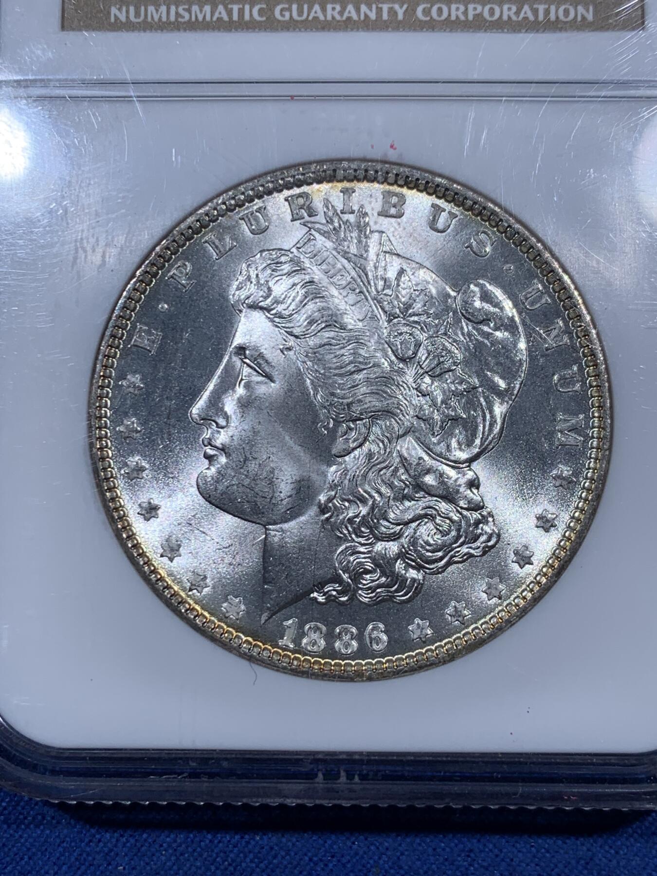 《竞宝斋》第405场 周日，周一，2场连拍 （全场包邮） NGC MS65 美国1886年摩根1美元银币 犀利转光