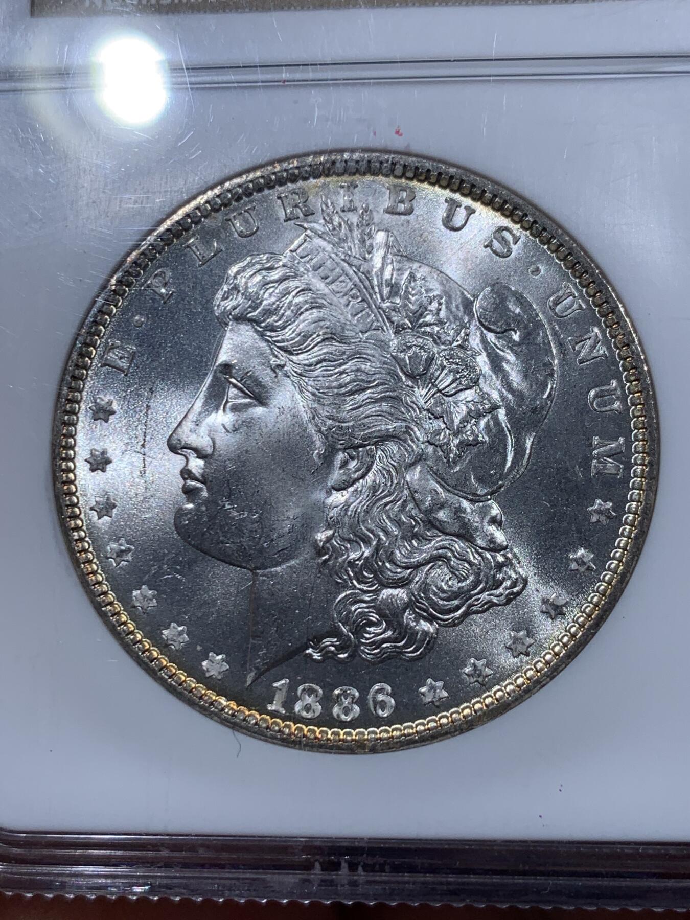 《竞宝斋》第405场 周日，周一，2场连拍 （全场包邮） NGC MS65 美国1886年摩根1美元银币 犀利转光