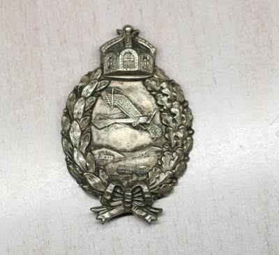 大猫徽章拍卖 第275期 德国一战飞行员奖章，铜合金镀银，标准容克厂（C．E．JUNCKER）特征，1917年左右版本，图案精细突出，稀少