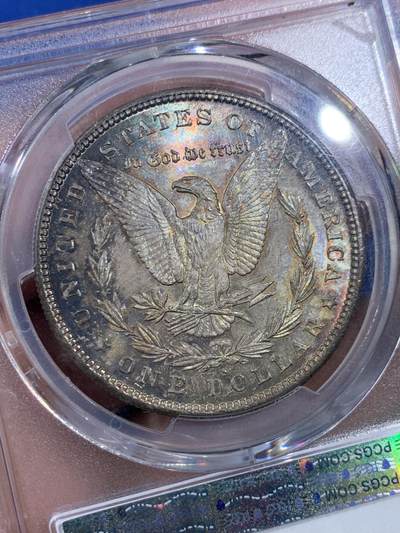 《竞宝斋》第406场 周日，周一，2场连拍 （全场包邮） PCGS MS64 美国 1879年 1美元 摩根 银币 五彩包浆 HA-MS64分拍卖价格在1300元 经典品种