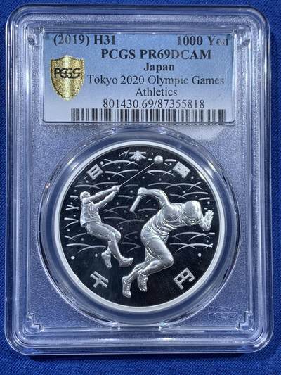《竞宝斋》第406场 周日，周一，2场连拍 （全场包邮） PCGS PR69DCAM 2019年2020日本东京奥运会田径1000日元精制银币 状态极佳，亚军分。备注：盒子背面卡槽有小磕碰，不影响盒子的密封 999银 31.1g