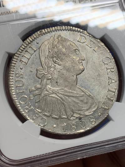 《竞宝斋》第406场 周日，周一，2场连拍 （全场包邮） NGC MS61 1808过渡年份 西属墨西哥卡四8里亚尔双柱 细节深打底板丝滑略呈镜面 盒子左侧有一小缺