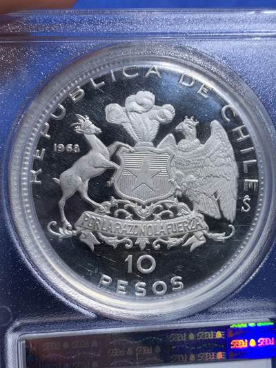 《竞宝斋》第406场 周日，周一，2场连拍 （全场包邮） PCGS-PR64DCAM 1968智利10比索 智利第一枚精制纪念银币 名誉品 非常少见 币面超大 45mm 45g PCGS加厚盒 浮雕极为清晰 四艘帆船错落有致 审美极佳