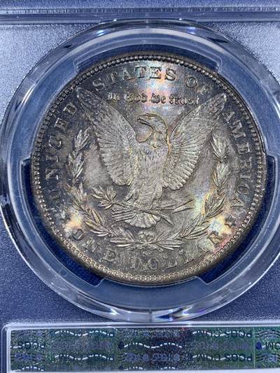 《竞宝斋》第406场 周日，周一，2场连拍 （全场包邮） PCGS MS64 美国 1879年 1美元 摩根 银币 五彩包浆 HA-MS64分拍卖价格在1300元 经典品种