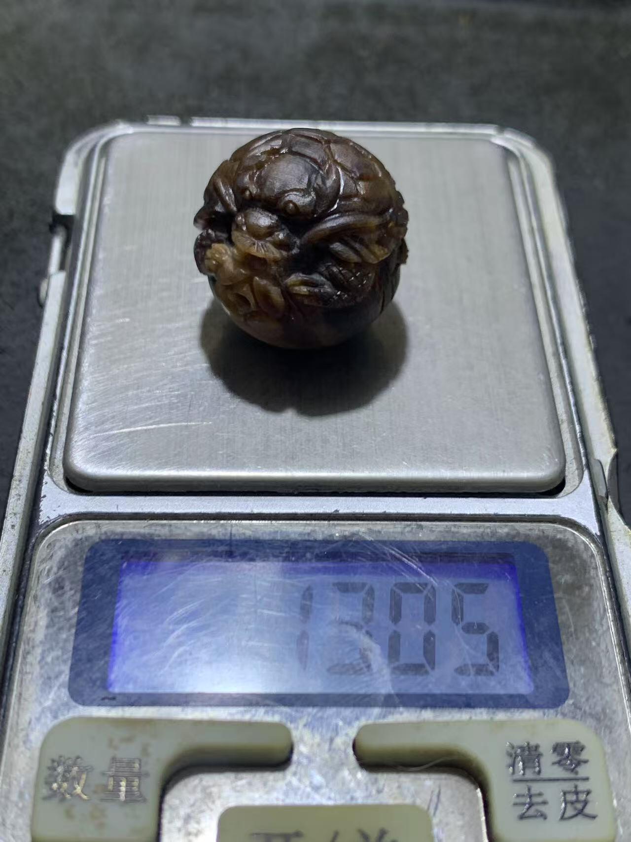 精美天然缅甸树化玉（木化玉）手工雕招财龙龟珠一颗！