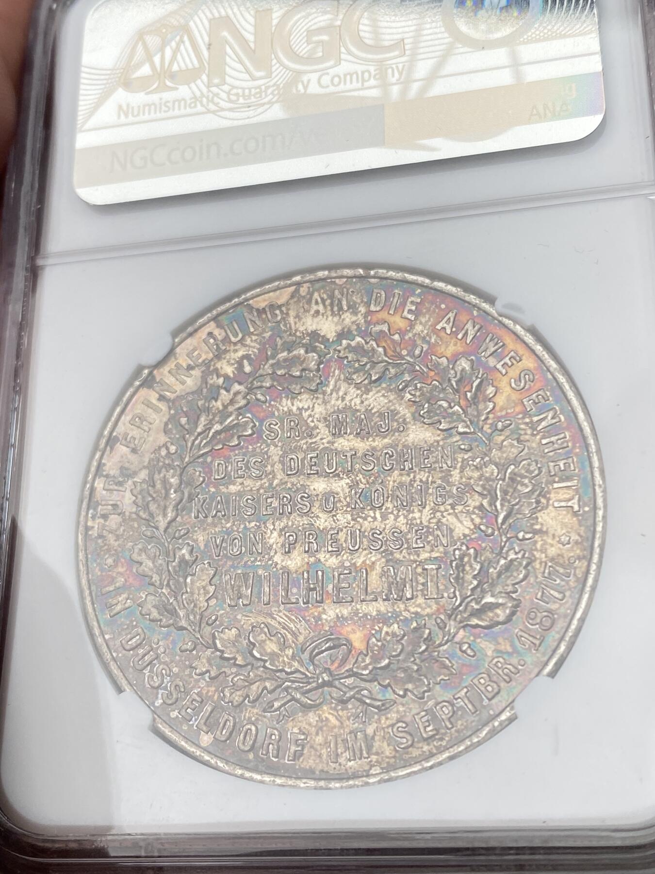 万国钱币拍卖第050期（万国五十期纪念大拍） NGC MS63 1877年德国威廉一世访问杜塞尔多夫纪念大银章 41MM 36G 极少见的银质版本 通体七色幻彩 NGC唯一冠军分