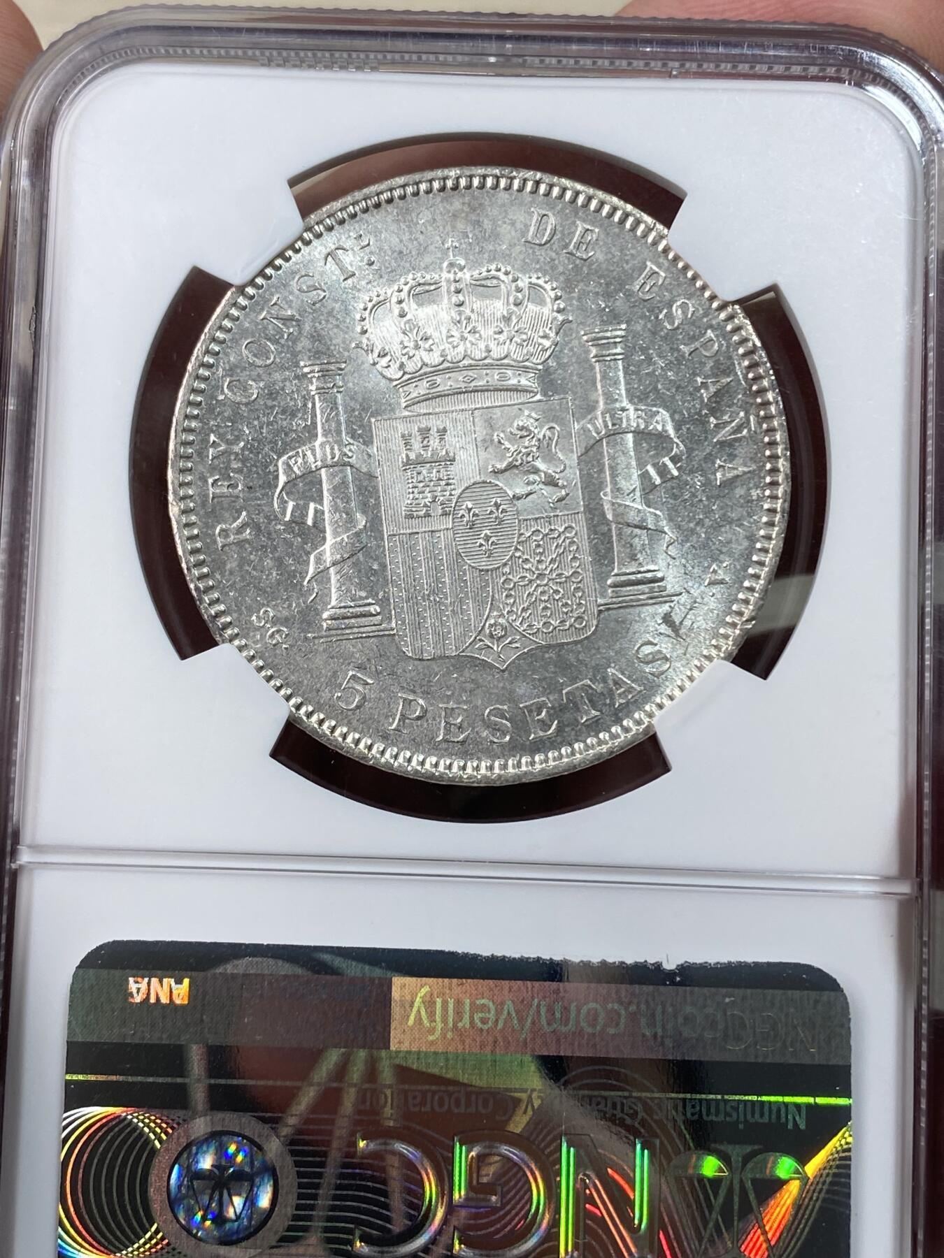 万国钱币拍卖第050期（万国五十期纪念大拍） NGC MS64 1898（98）西班牙阿方索十三世5比塞塔 海量流通的品种 6263都比较常见 但是想找到一枚如此品相的绝非易事 NGC亚军分 更高分仅一枚