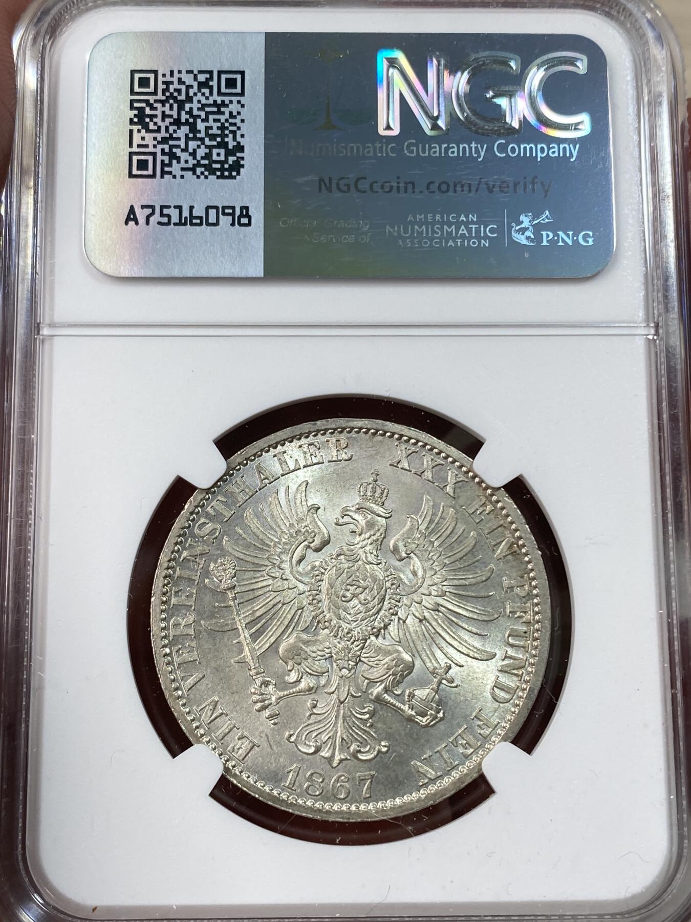 万国钱币拍卖第050期（万国五十期纪念大拍） NGC MS64+ 1867年德国普鲁士威廉国王帝国鹰流通1泰勒 银霜寒光丝绸底板 NGC季军分 