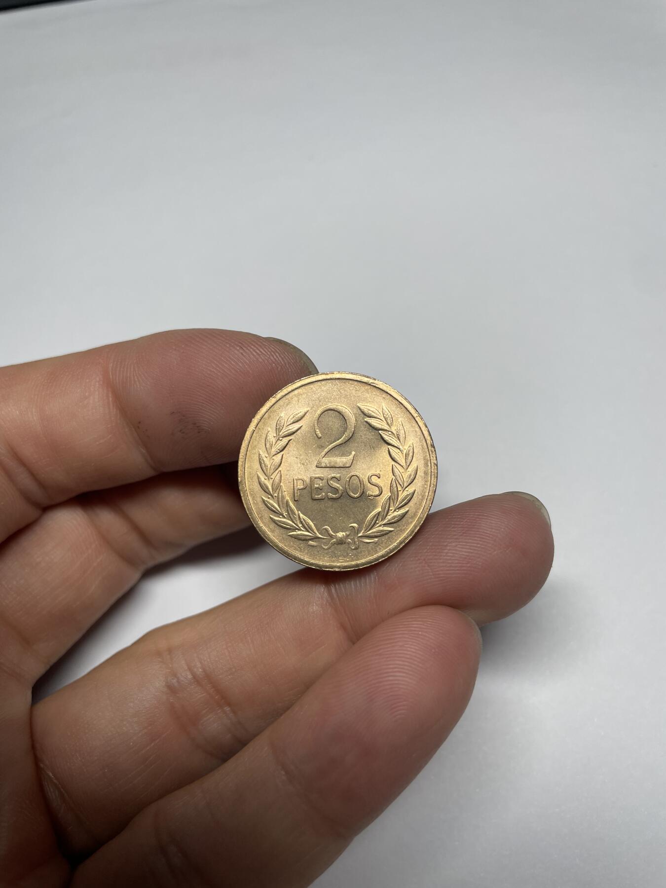 2025年集古藏今外币拍卖第七期-第7场—（总第257拍），可以寄存60天，满160元包邮。 1977年哥伦比亚2比索