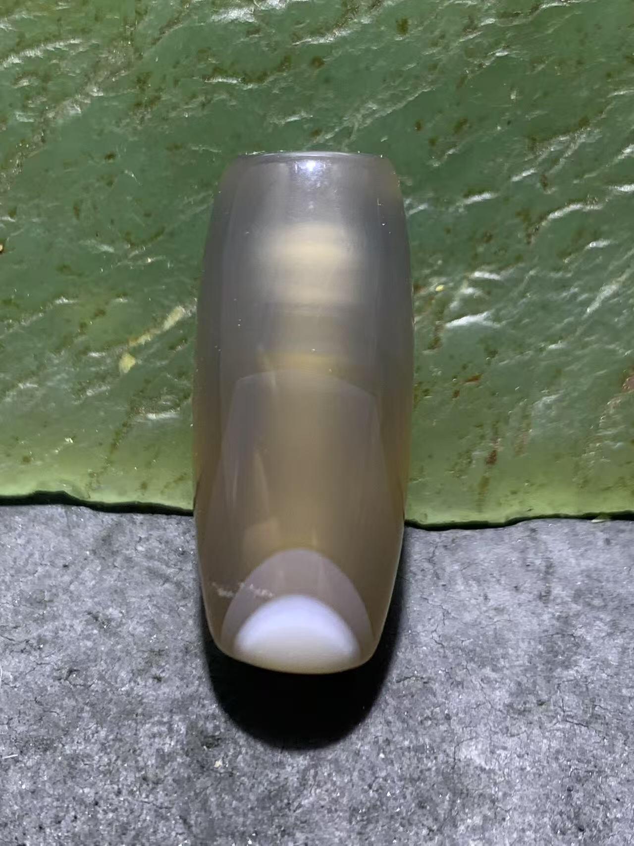 高玉化冻料巴西玛瑙随形通货桶珠一个，
