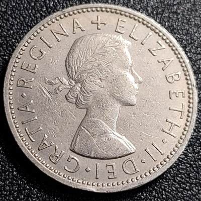 泉币菌-第69场-精品欢乐场-第2场 / 福利放送，感谢大家一直以来的支持。68-72场中，凡拍中15单及以上者，非偏远地区购买者，其所购所有商品满30包邮。       （特别说明：偏远地区包邮条件除满足购满15单及以上外，内蒙古、青海、西藏、宁夏需要满48包邮，新疆、西藏需要满68包邮。） 好品 英国早期1963年2先令老镍币 伊丽莎白二世青年女王头像 28.3MM