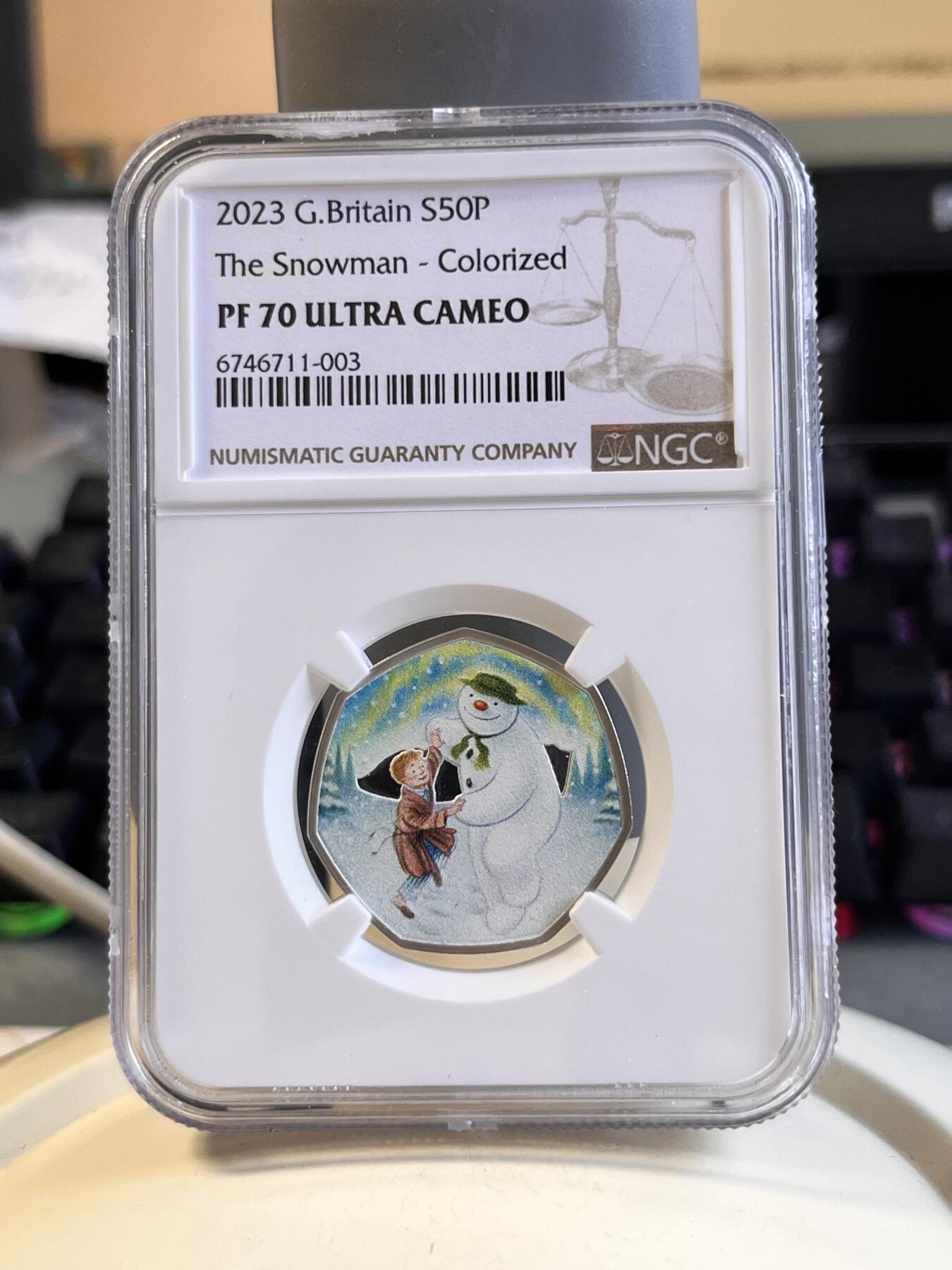 第168期拍卖【长期征集拍品】 英国2023年雪人50便士彩色精制纪念银币NGC-PF70原盒证书，925银，8克，发行5000枚