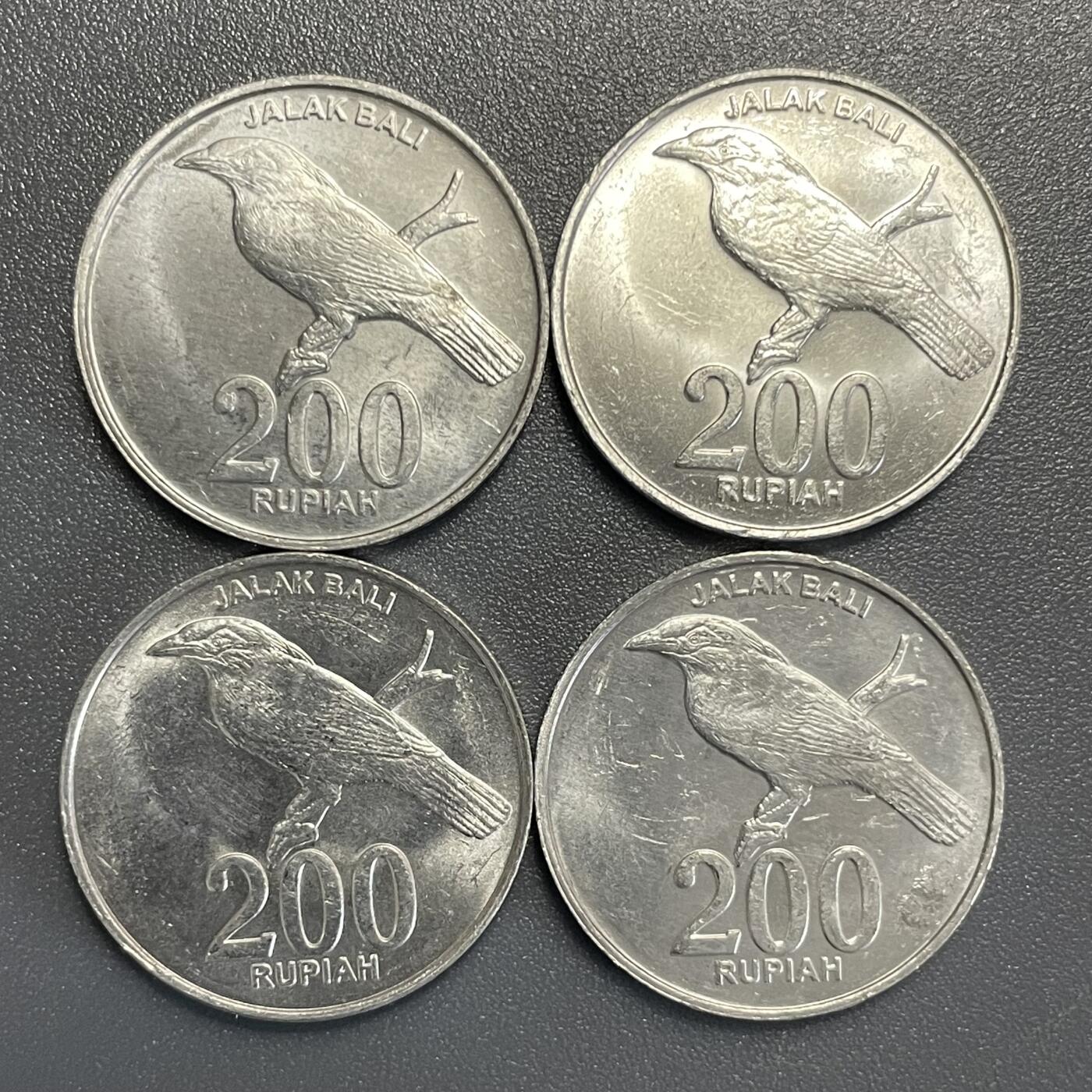 回流0801 全新原光印尼200盾4枚 画眉鸟