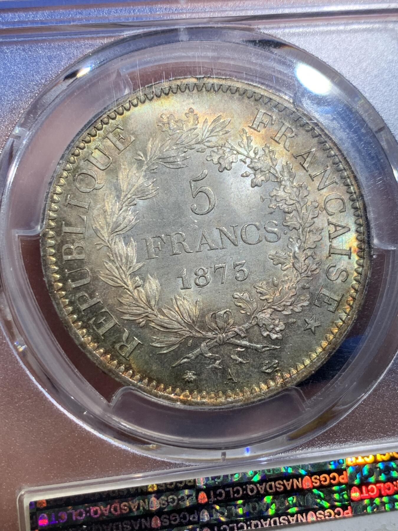 《竞宝斋》第407场 周日，周一，2场连拍 （全场包邮） PCGS MS66 法国1873年大力神5法郎银币，该版本最高分67分，这枚细节完美，正反面细节突出，视线所及之处皆为五彩，难得藏品。
