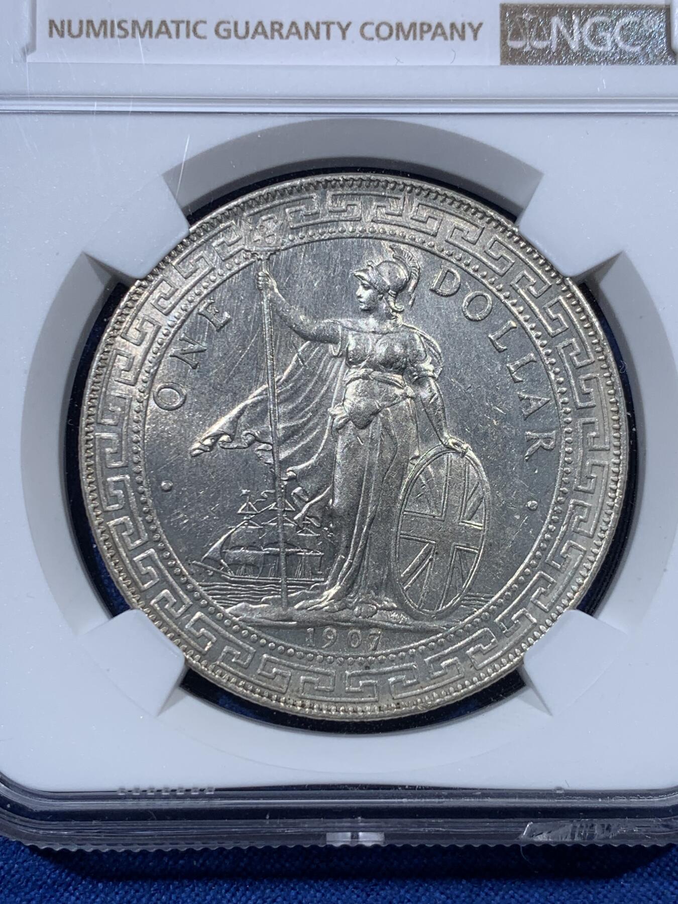 《竞宝斋》第407场 周日，周一，2场连拍 （全场包邮） NGC MS61 英国 1907B 站洋 1圆银币 下沿有裂 细节见图