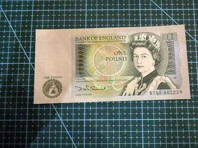 【炜奕收藏】，第四十期 - 英国D序列1镑，UNC品相，邮封拆除四角不绝