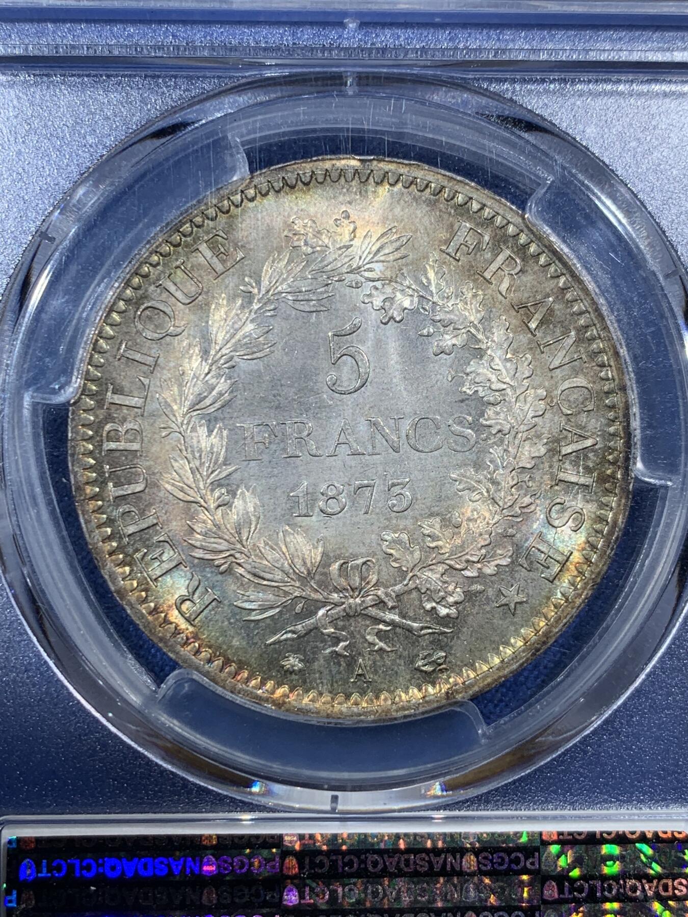 《竞宝斋》第407场 周日，周一，2场连拍 （全场包邮） PCGS MS66 法国1873年大力神5法郎银币，该版本最高分67分，这枚细节完美，正反面细节突出，视线所及之处皆为五彩，难得藏品。