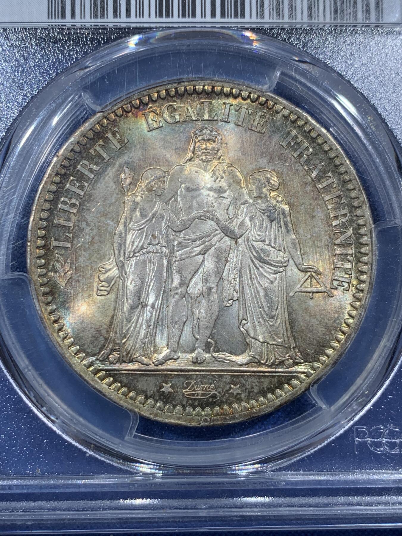 《竞宝斋》第407场 周日，周一，2场连拍 （全场包邮） PCGS MS66 法国1873年大力神5法郎银币，该版本最高分67分，这枚细节完美，正反面细节突出，视线所及之处皆为五彩，难得藏品。