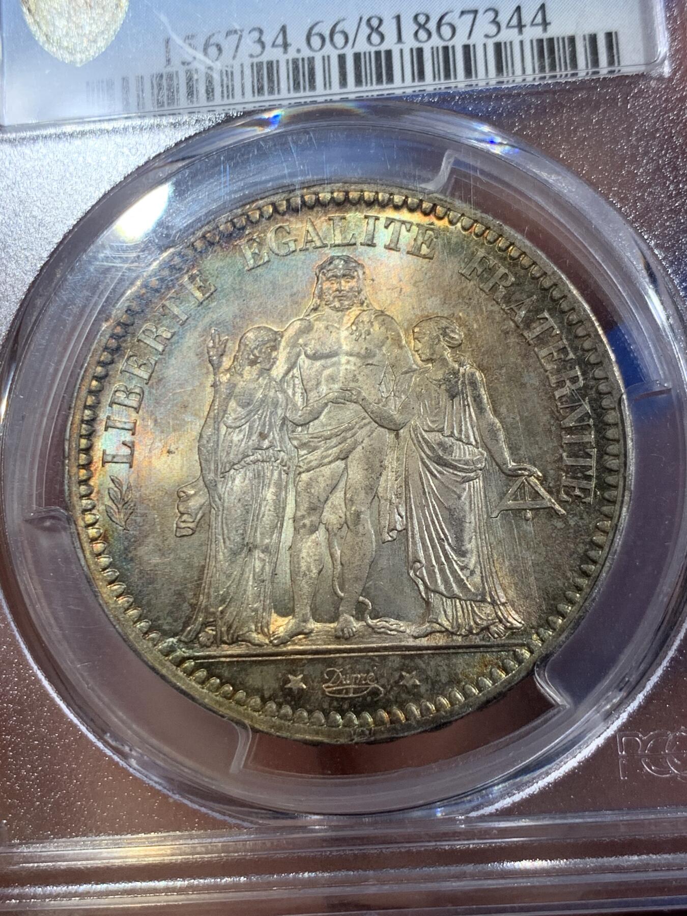 《竞宝斋》第407场 周日，周一，2场连拍 （全场包邮） PCGS MS66 法国1873年大力神5法郎银币，该版本最高分67分，这枚细节完美，正反面细节突出，视线所及之处皆为五彩，难得藏品。