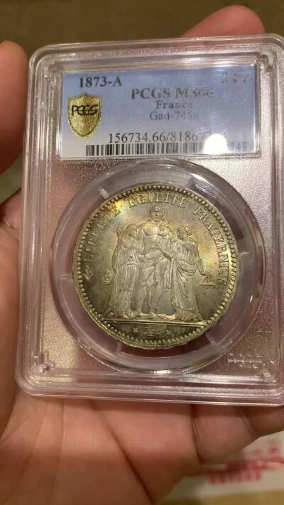 《竞宝斋》第407场 周日，周一，2场连拍 （全场包邮） PCGS MS66 法国1873年大力神5法郎银币，该版本最高分67分，这枚细节完美，正反面细节突出，视线所及之处皆为五彩，难得藏品。
