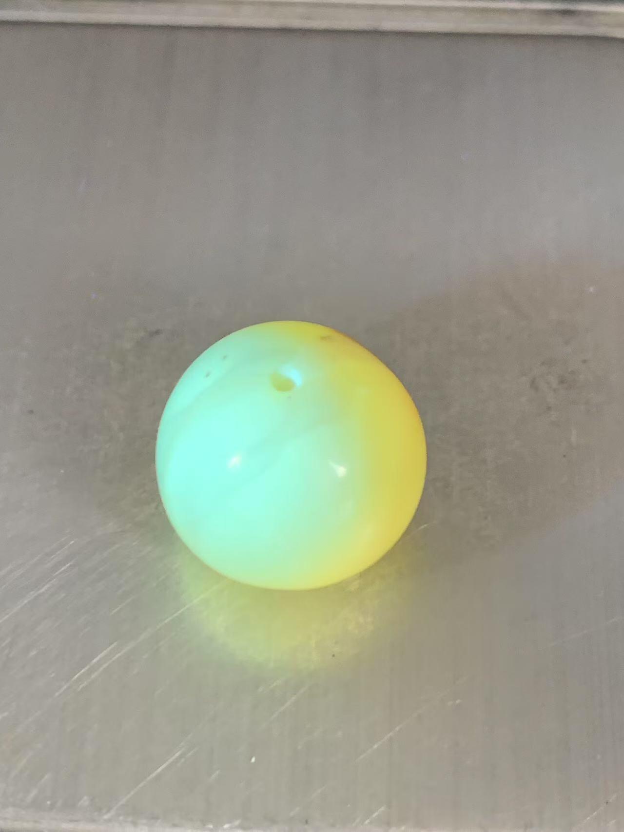 天然乌克兰原矿蜜蜡通货随形圆珠一颗