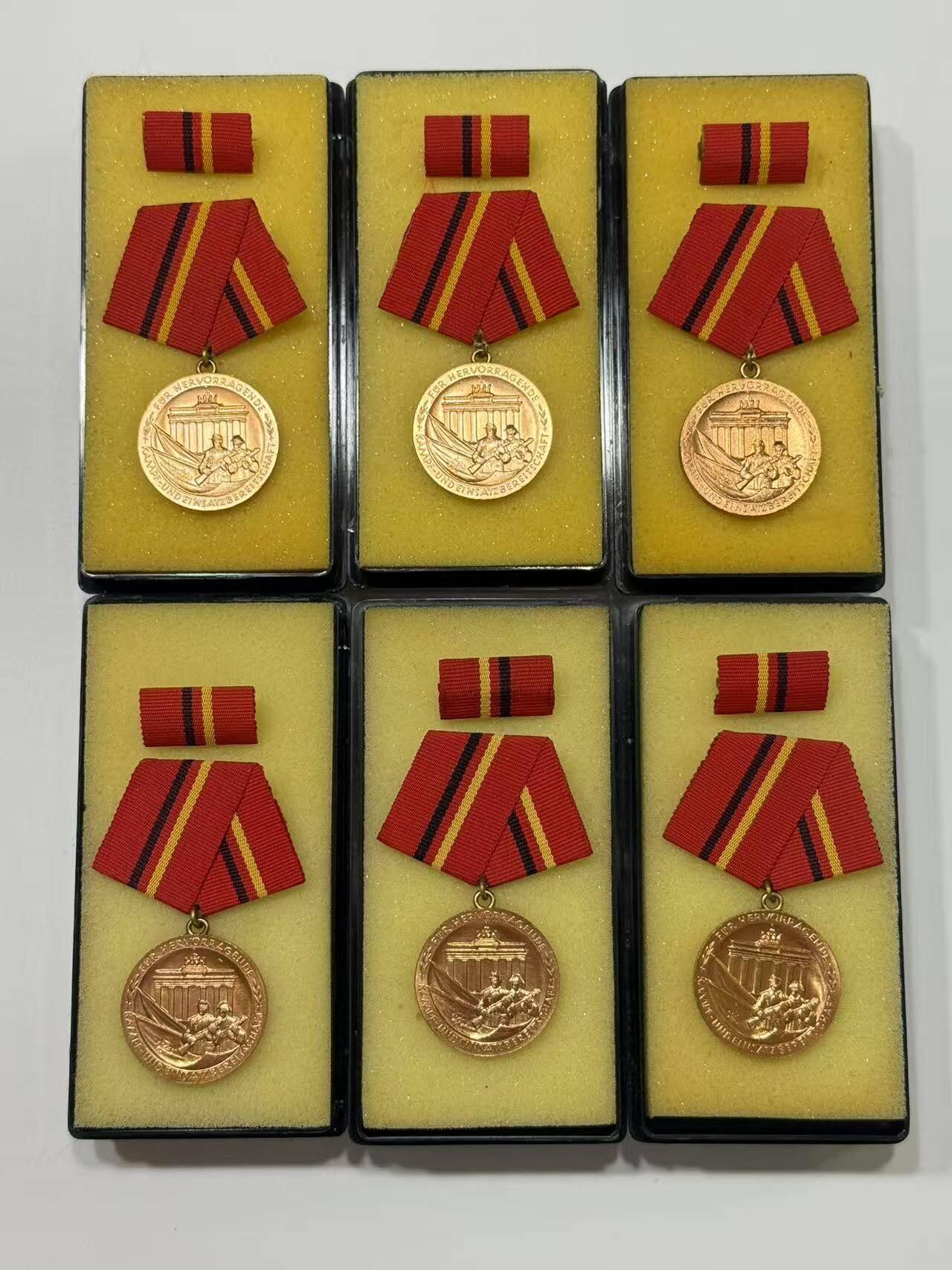 RimeNova韵星2025军品类夏季拍卖会-- RimeNova 2025 Summer Militaria Sale 民主德国铜级工战队功绩奖章带盒略一组六个
