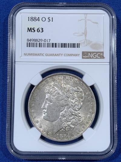 《竞宝斋》第408场 周日，周一，2场连拍 （全场包邮） - NGC MS63 美国1884年摩根1美元银币，原光淡彩好品。