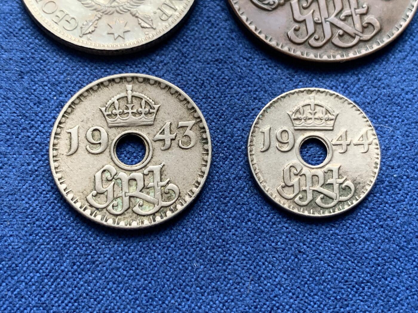 《竞宝斋》第408场 周日，周一，2场连拍 （全场包邮） 4枚一组 英属新几内亚1938-1944年乔治六世 含1枚银币