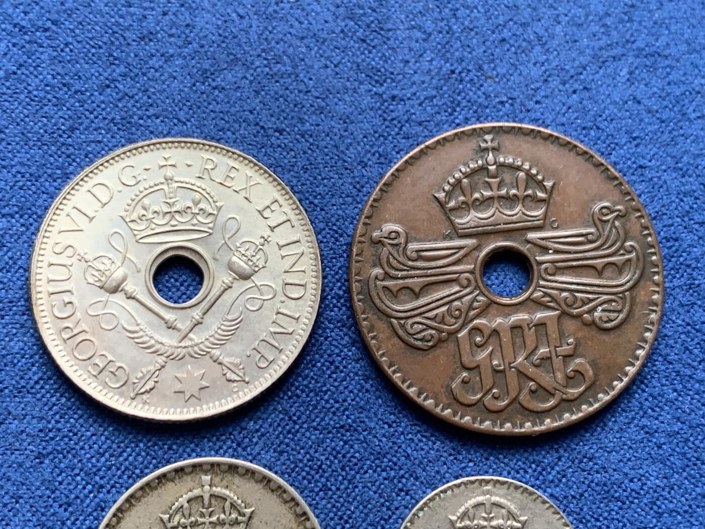 《竞宝斋》第408场 周日，周一，2场连拍 （全场包邮） 4枚一组 英属新几内亚1938-1944年乔治六世 含1枚银币