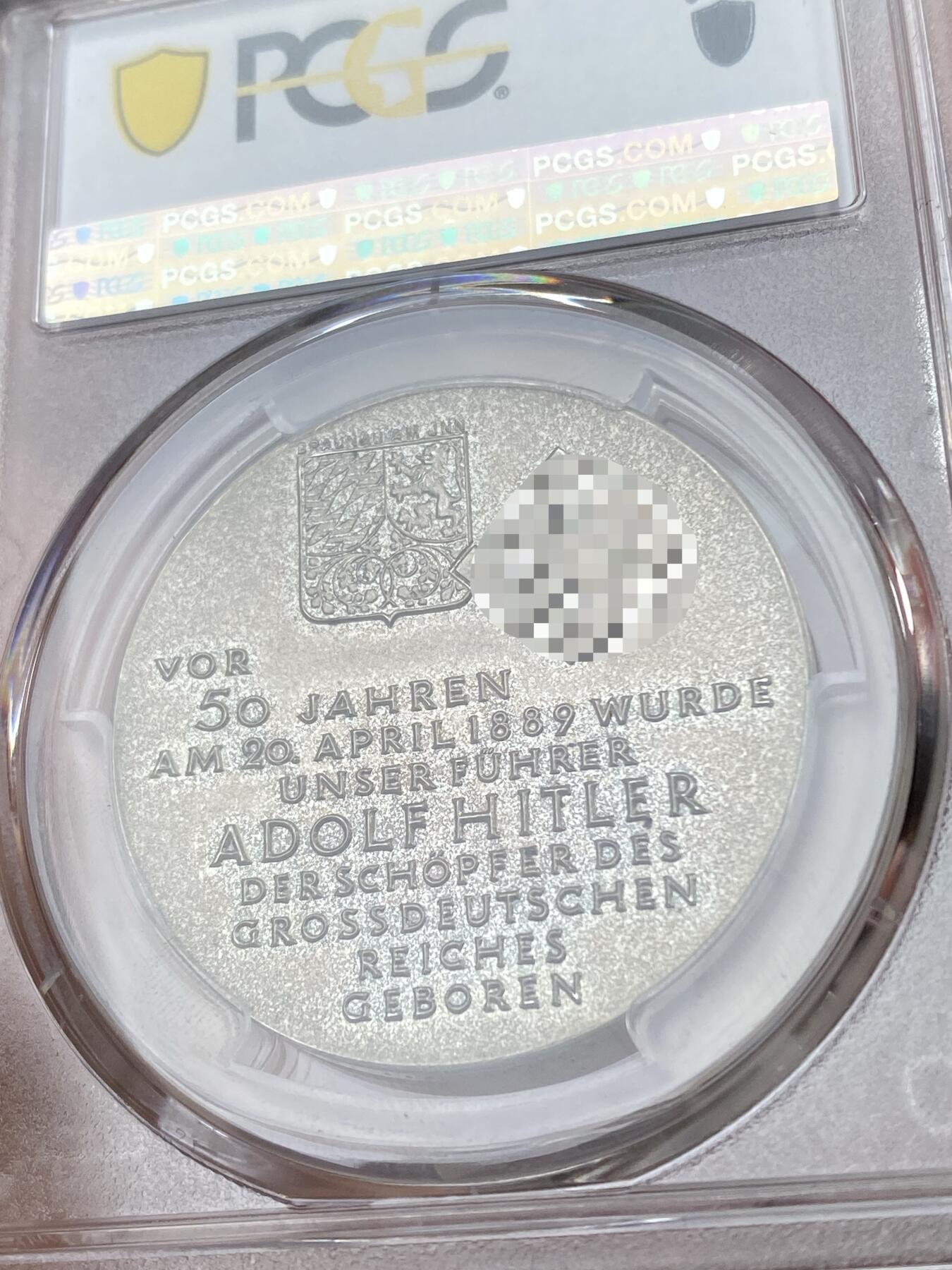 万国钱币拍卖第050期（万国五十期纪念大拍） PCGS SP65 1939年德国民族社会主义工人党党魁50大寿纪念银章 党魁在生日收到位于贝希特斯加登的“鹰堡” 顶级天鹅绒彩包浆 （原图请私信后台或自行查询官网）