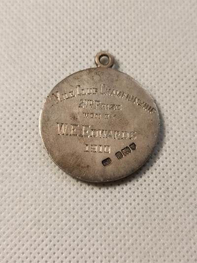甄臻铺-世界币章拍卖（第28期），送拍享返佣金等优惠多多 伦敦港务局游泳俱乐部1910年银奖章，正面船锚图案，背面W.F.Edwards字样重17.4g，直径31.5mm