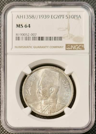 甄臻铺-世界币章拍卖（第28期），送拍享返佣金等优惠多多 - NGC-MS64 1939年埃及法鲁克国王10皮阿斯特银币，正面刻有法鲁克国王头像，背面阿拉伯文和花卉装饰，品相完好，包浆自然，更高分只有8枚