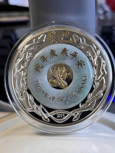 第170期拍卖【长期征集拍品】 - 老挝2013年中国生肖系列蛇年2盎司镶金玉纪念银币，999银，发行2888枚，边缘稍有氧化