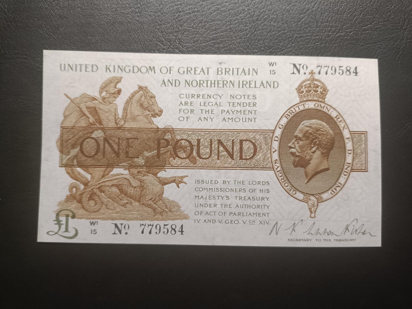 2025八月第二期（总187期） 英格兰1928版1镑AUNC有针孔，乔治五世国王圣乔治屠龙和威斯敏斯特议会