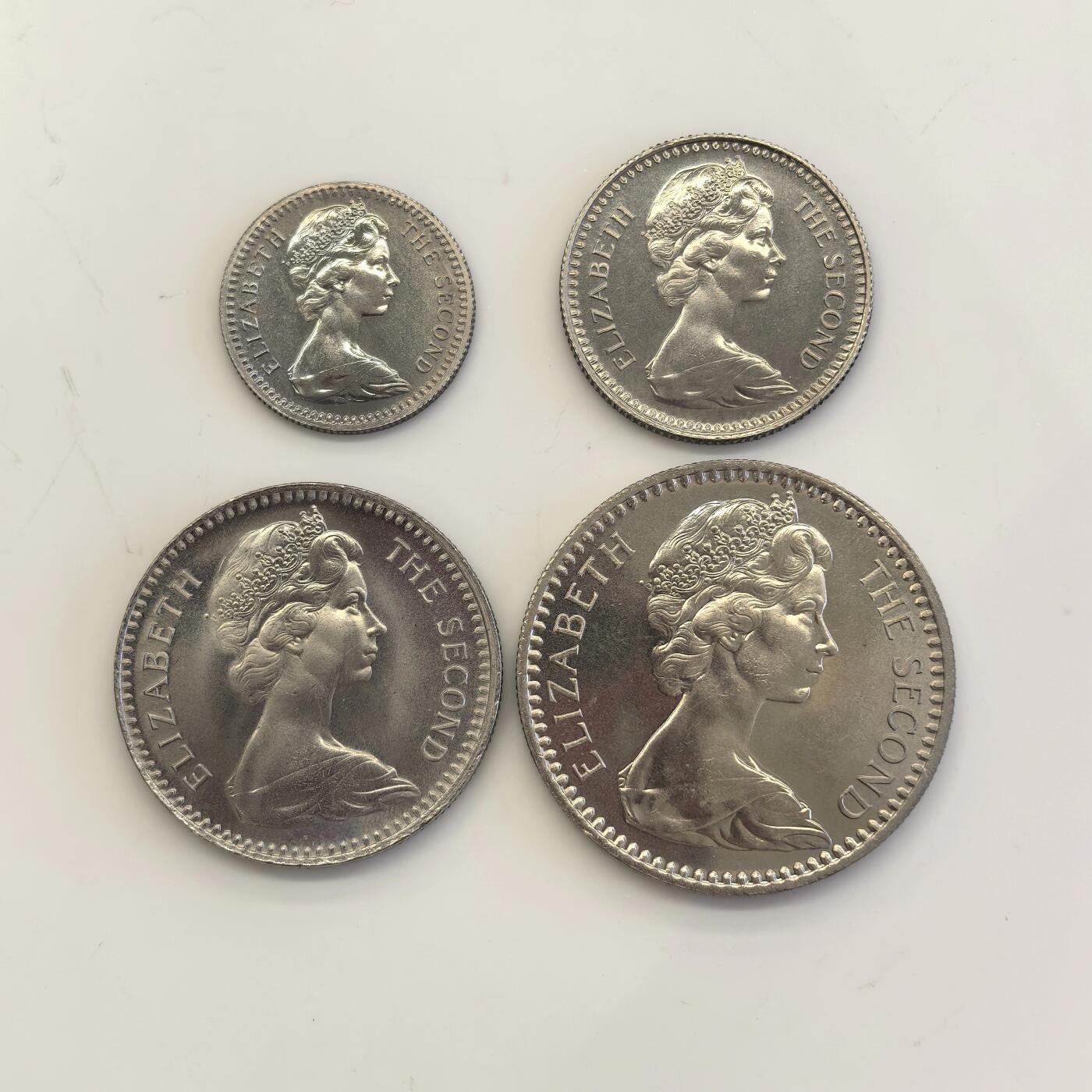 博洋堂世界钱币拍卖第134期（全场包邮） 英属罗德西亚1964年伊丽莎白二世6便士/5分-2.5先令/25分 双面值精制镍币 整套品相优异 油膜五彩绝美 发行量仅2060套 附带原盒