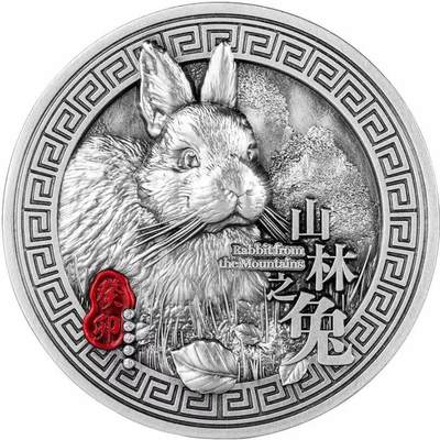 第169期拍卖【长期征集拍品】 - 乍得2023年，中国生肖系列:兔年-山林之兔. 2盎司超高超精超清晰浮雕、币边雕铸唯一冠号、仿古彩色银币. 盒证全. 凸出高度近4毫米的超高超精超清浮雕,每一根毛发都立体可数. 发行仅333枚. 中国元素,国外售价355美元