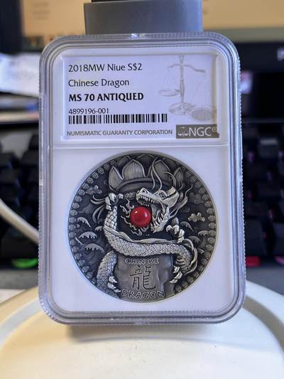 第169期拍卖【长期征集拍品】 - 纽埃2018年世界龙系列镶嵌2盎司浮雕银币NGC-MS70原盒证书，999银，发行500枚