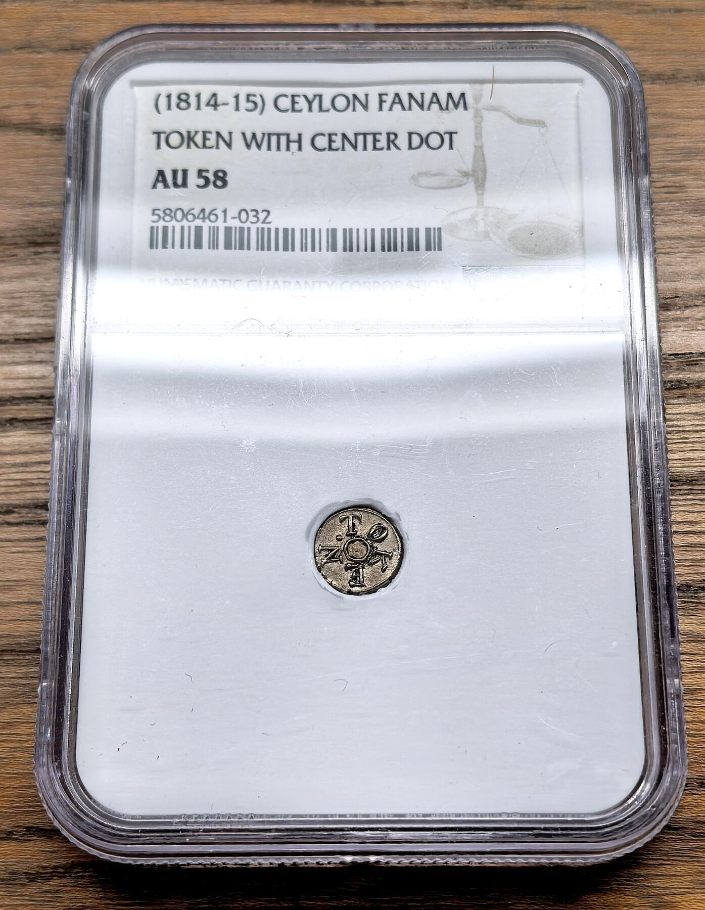 凡希社世界钱币微拍第三百零九期 1814-15英属锡兰fanam银币NGC-AU58，原铸品，正反中心圈内带点，12fanams=1Rixdollar=1Rupee。