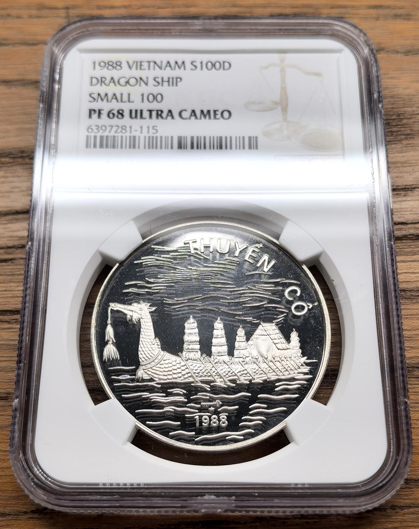 凡希社世界钱币微拍第三百零九期 1988越南龙舟100D银币精铸NGC-PF68UC，小字100版。