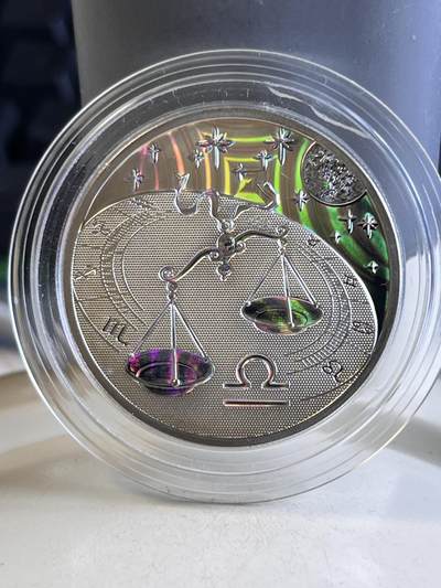 第170期拍卖【长期征集拍品】 - 喀麦隆2010年十二星座系列天枰全息幻彩纪念银币，925银全息幻彩，15.5克