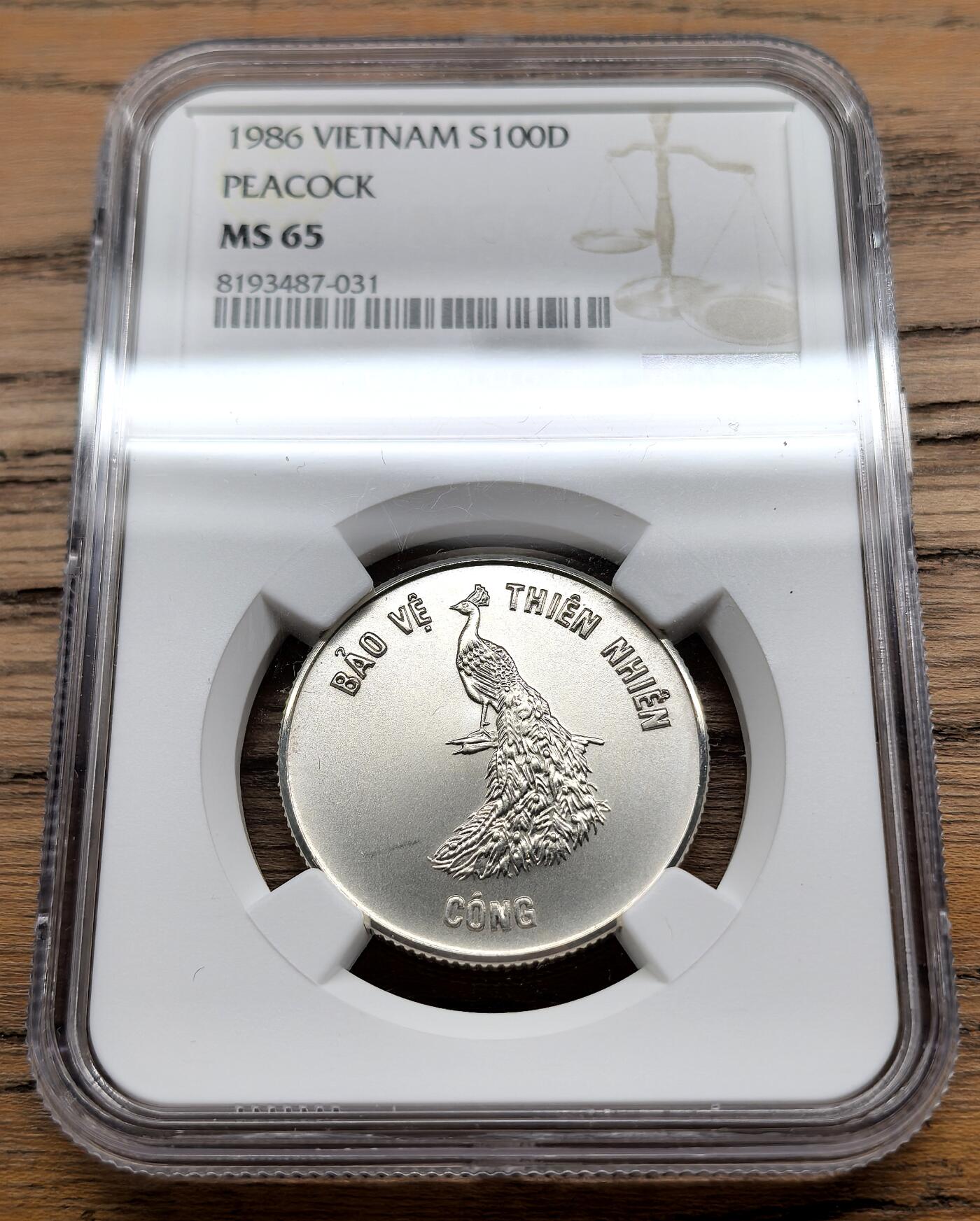 凡希社世界钱币微拍第三百零九期 1986越南孔雀100D银币NGC-MS65